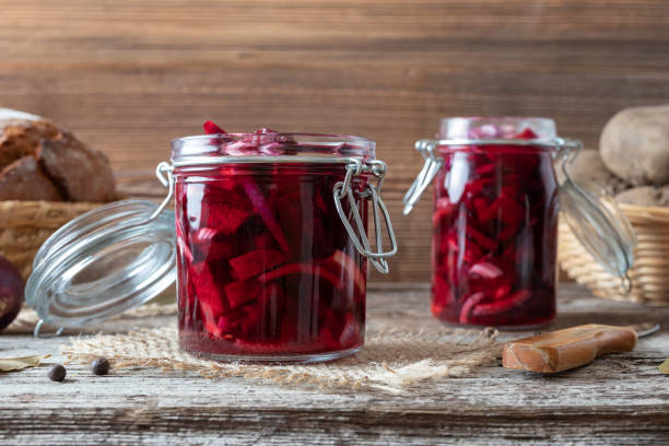 Fermented beet kvass in two jars stock photo
