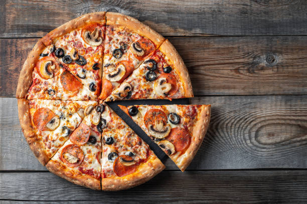Tasty pepperoni pizza with mushrooms and olives.