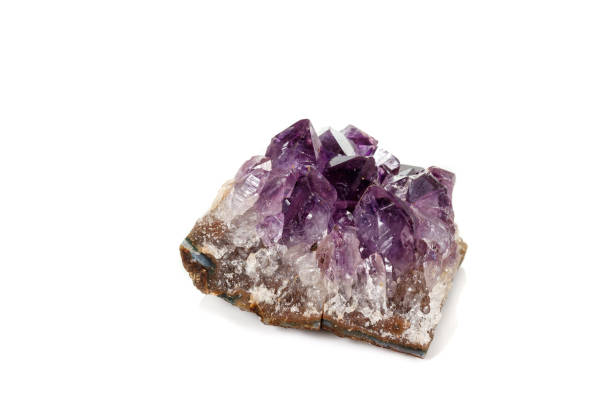 istock Amethyst Crystal Druse  macro mineral on white background 1131779577