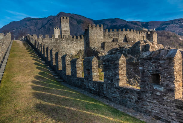 castelgrande (aka, uri and saint michael's castle), bellinzona, the capital city of southern switzerlandâs ticino canton. a unesco world heritage site, known for its 3 medieval castles: castelgrande, sasso corbaro and and montebello - feudalism imagens e fotografias de stock