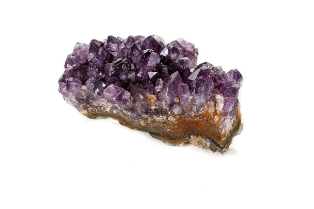 istock Amethyst Crystal Druse  macro mineral on white background 1131780234