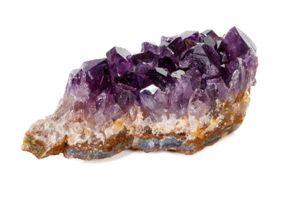 istock Amethyst Crystal Druse  macro mineral on white background 1131780291