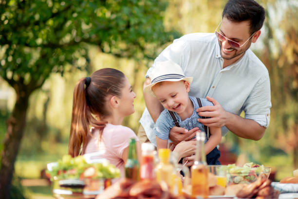 istock Family having lunch in their garden 1131781998