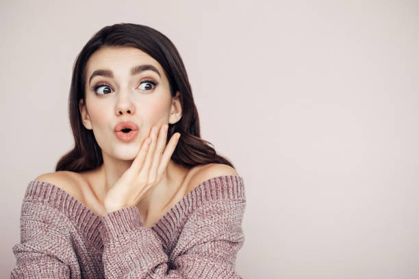 istock Beautiful woman with curly hair 1131782987