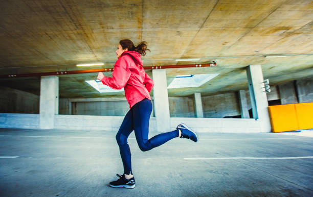 istock Young Woman Exercising in an Urban Environment 1131783020