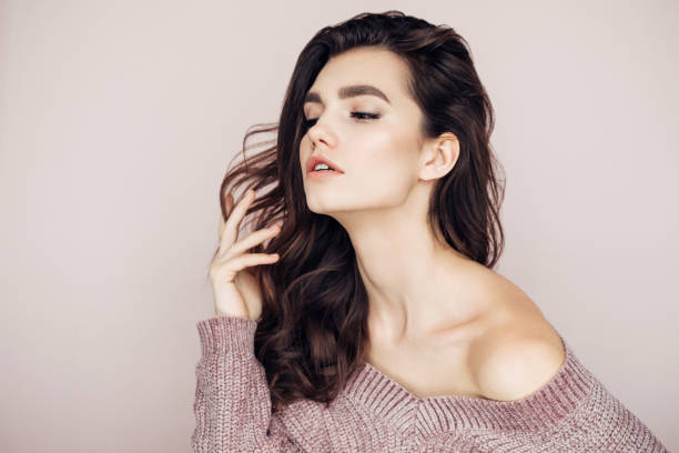istock Beautiful woman with curly hair 1131783094