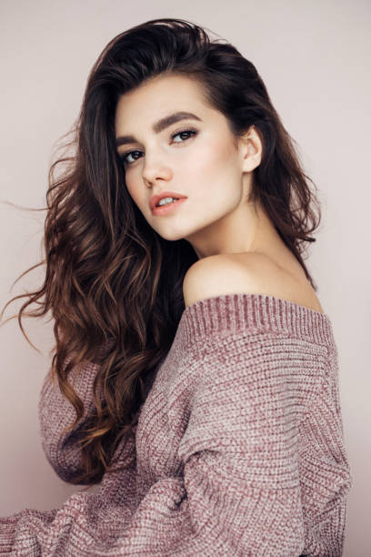 istock Beautiful woman with curly hair 1131783162