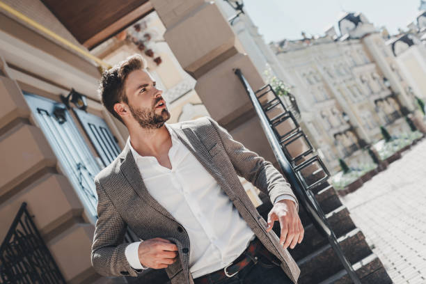 istock Learn to let go. That is the key to happiness. Serious brown-haired man standing outdoors after a hard day 1131784743