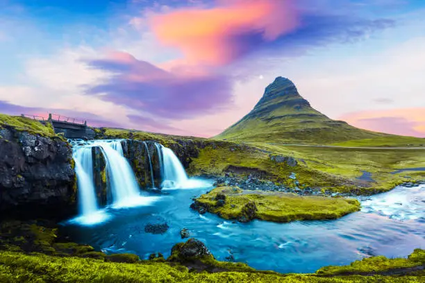 Photo of Colorful sunrise on Kirkjufellsfoss waterfall