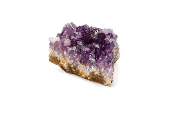 istock Amethyst Crystal Druse  macro mineral on white background 1131785524