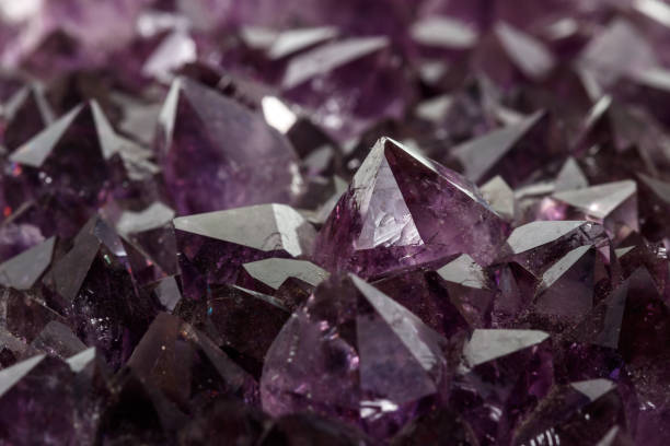 istock Amethyst Crystal Druse  macro mineral on white background 1131785803