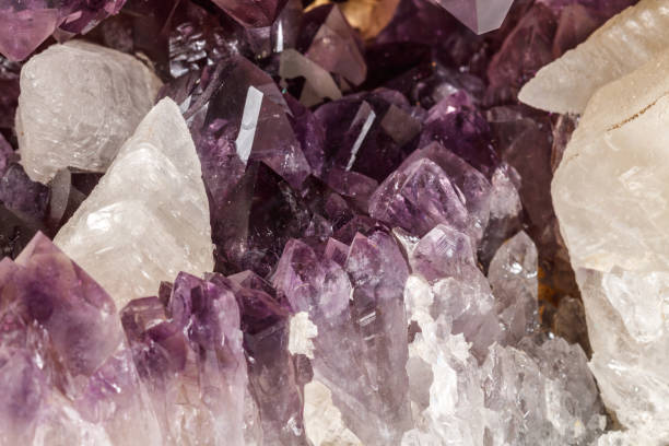 istock Amethyst Crystal Druse  macro mineral on white background 1131785831