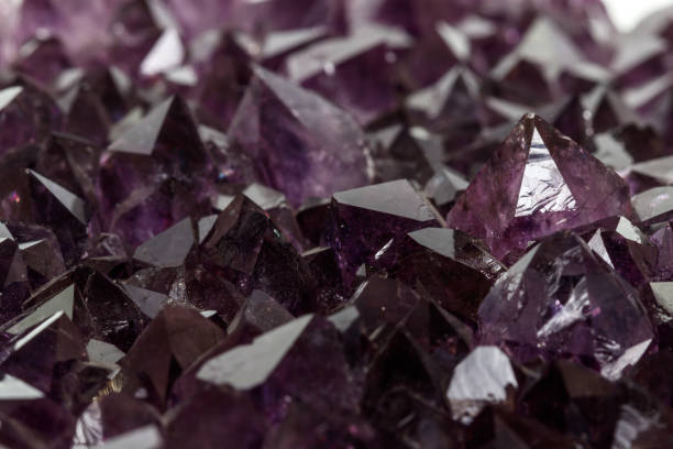 istock Amethyst Crystal Druse  macro mineral on white background 1131785869