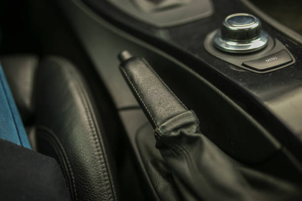 istock handbrake lever in a car with leather upholstery 1131786257