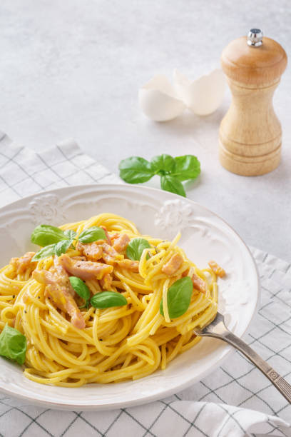 istock Italian pasta carbonara with ham, basil and eggs. 1131787133