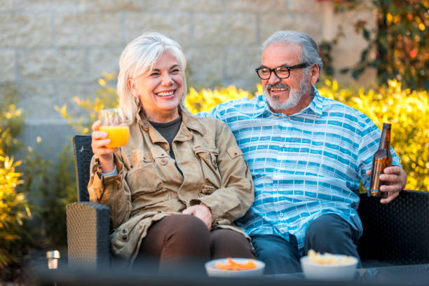 istock Senior couple having drinks at patio 1131788639