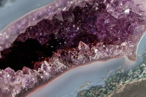 istock Amethyst Crystal Druse  macro mineral on white background 1131789278