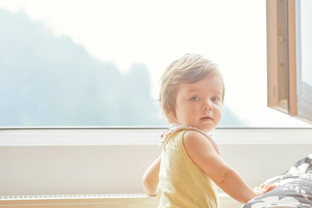 istock cute little girl looking at camera 1131792816
