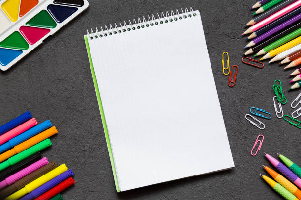 istock School notebook and various stationery. Back to school concept. 1131792961