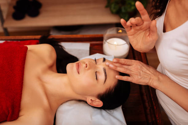 istock Exotic expert woman in white uniform being unusual masseuse 1131793075