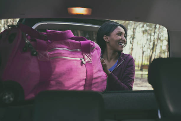 istock Woman loading the car. She's ready to start her vacation. 1131796083