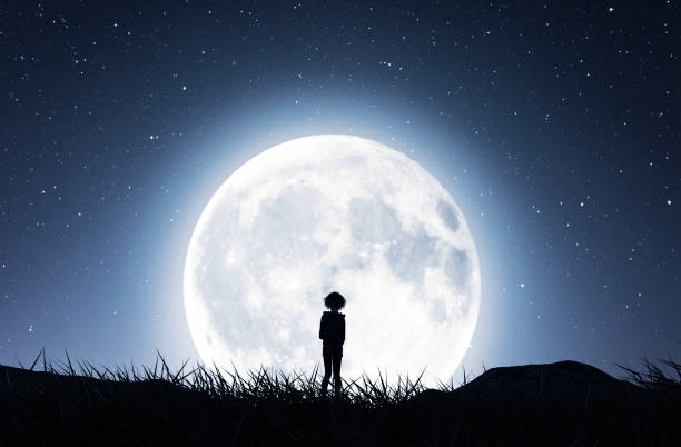 istock Girl walking to the moon 1131797102