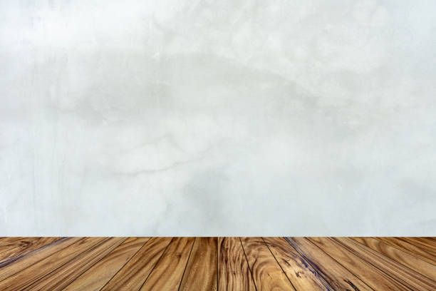 istock Wooden floor pattern perspective. On gray cement background. For product display 1131798005