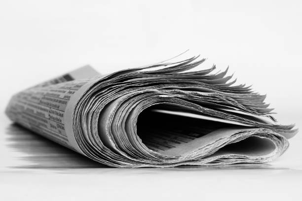 istock Closeup of newspapers 1131803016