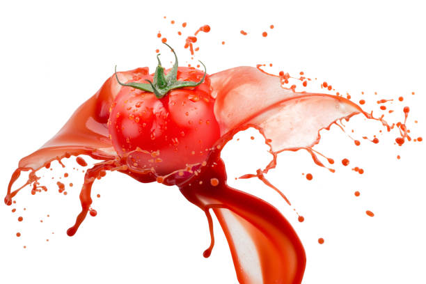 istock tomato in juice splash on a white background 1131803534