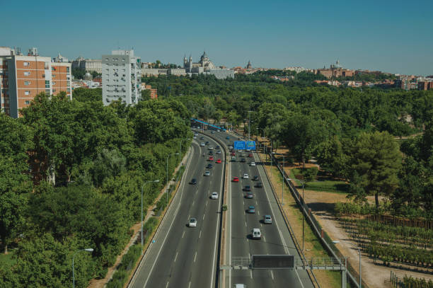 istock Highway with heavy traffic and trees in Madrid 1131809768