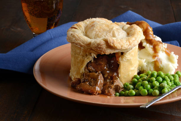 istock beef meat pie with vegetables and gravy 1131810612