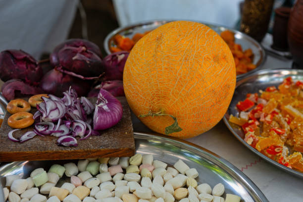 istock Still-life of a yellow melon and sweets 1131810989
