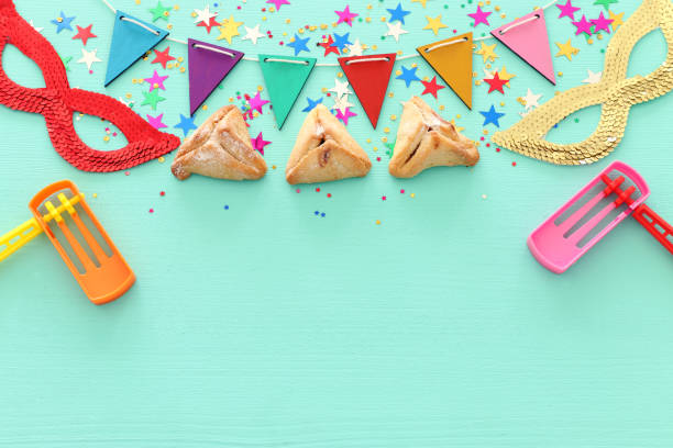 istock Purim celebration concept (jewish carnival holiday) over wooden blue background 1131812015