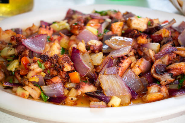 istock Fried Octopus Ceviche traditional Mexican Dish on White plate. 1131814147