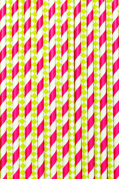 istock Paper drinking straws plastik pink color. Vertical background 1131816955