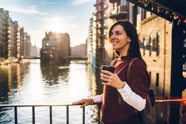 istock Woman exploring Hamburg old town 1131818420
