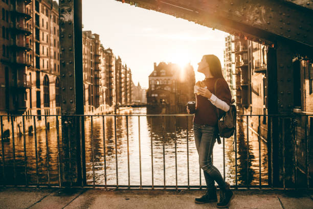 istock Woman exploring Hamburg old town 1131818694