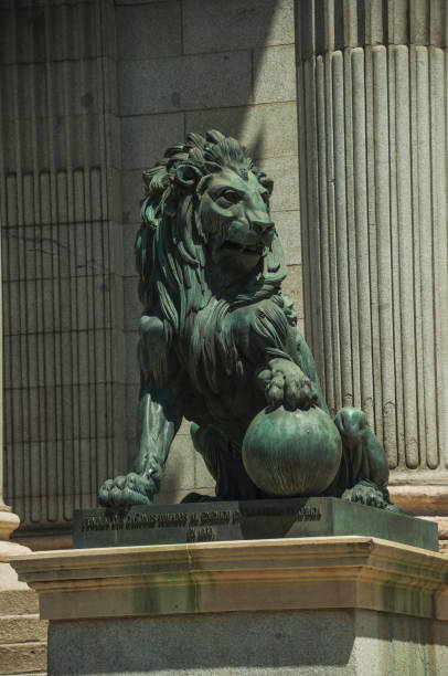 istock Sculpture lion cast in bronze on building facade in Madrid 1131820543