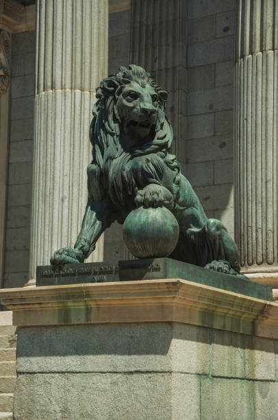 istock Sculpture lion cast in bronze on building facade in Madrid 1131820633
