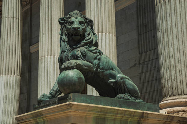 istock Sculpture lion cast in bronze on building facade in Madrid 1131821841