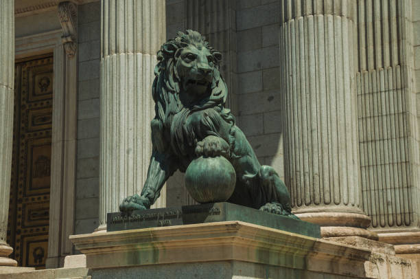 istock Sculpture lion cast in bronze on building facade in Madrid 1131822034