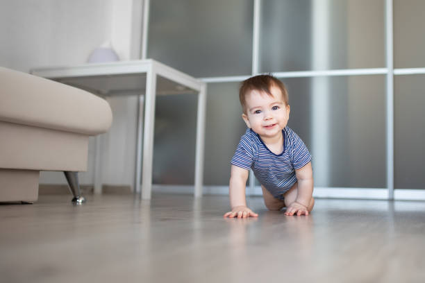 istock crawling baby boy at home 1131822816
