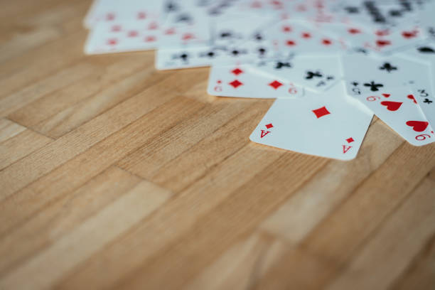 istock Cards lying on rustic wood table, playing cards. Copy space. 1131822945