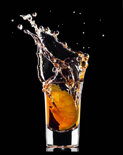 istock shot of tequila with splash 1131823036