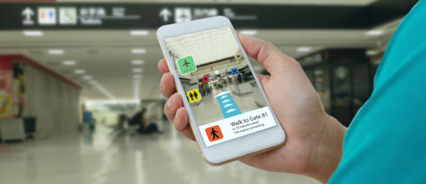istock smart technology in industry mobile 4.0 or 5.0 concept , user use mobile phone with augmented mixed virtual reality technology in real 3d for show the map,shop,  and walk way path to gate in airport 1131823380