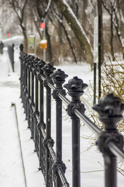istock Park in the city covered with snow. 1131824840