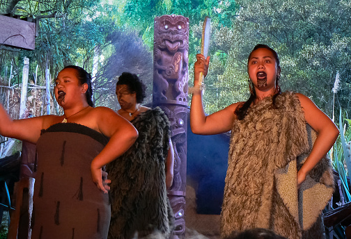 Rotorua, New Zealand - December 24, 2007: Maori women dance and performance to lend an insight into maori culture at Mitai Maori Village, Rotorua, North Island, New Zealand