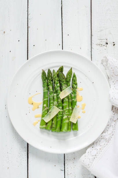 istock Asparagus with hollandaise sauce and parmesan from above 1131829182