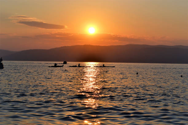 istock Canoeists at Sunset, Skiathos, Greece. 1131830602