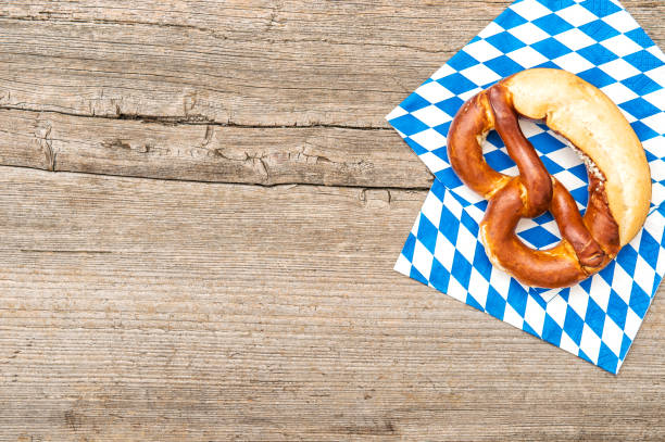 istock Bavarian bread pretzel board wooden background 1131831256